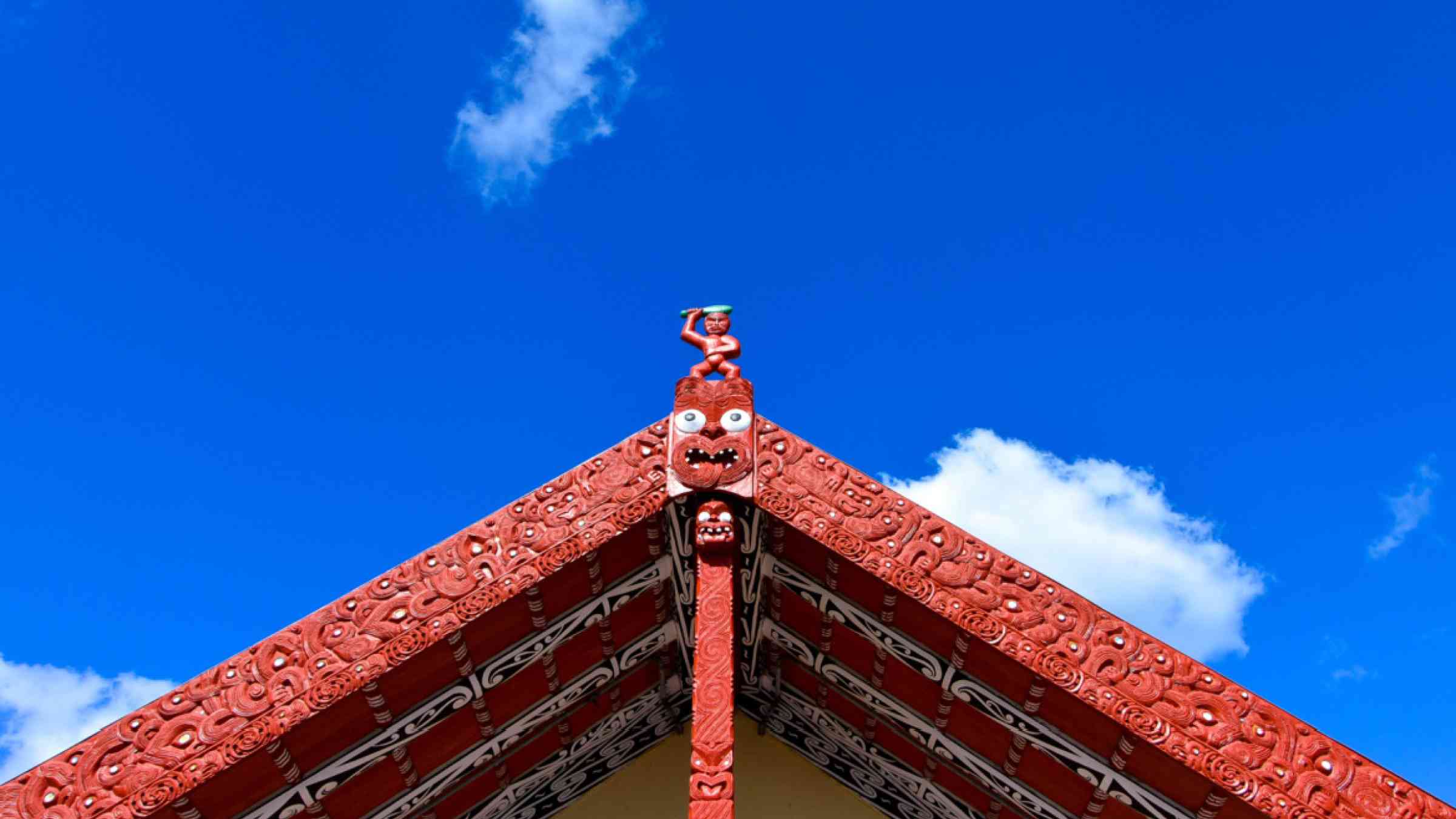 Traditional indigenous Maori house roof under the sky